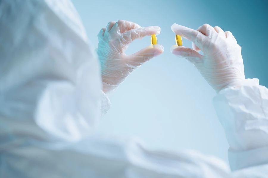 Researcher looking at omega-3 supplements